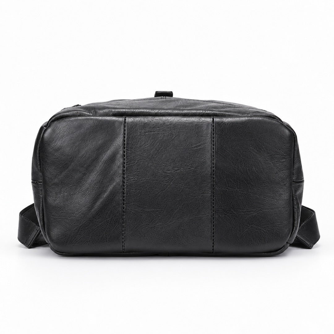 A black leather shoulder bag with a top zipper and a top carry handle, shown against a plain white background.
