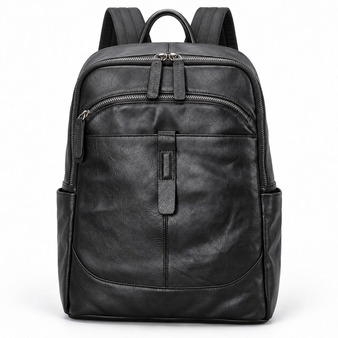 Black leather backpack with multiple zippered compartments, side pockets, and top handle, shown on a plain white background.