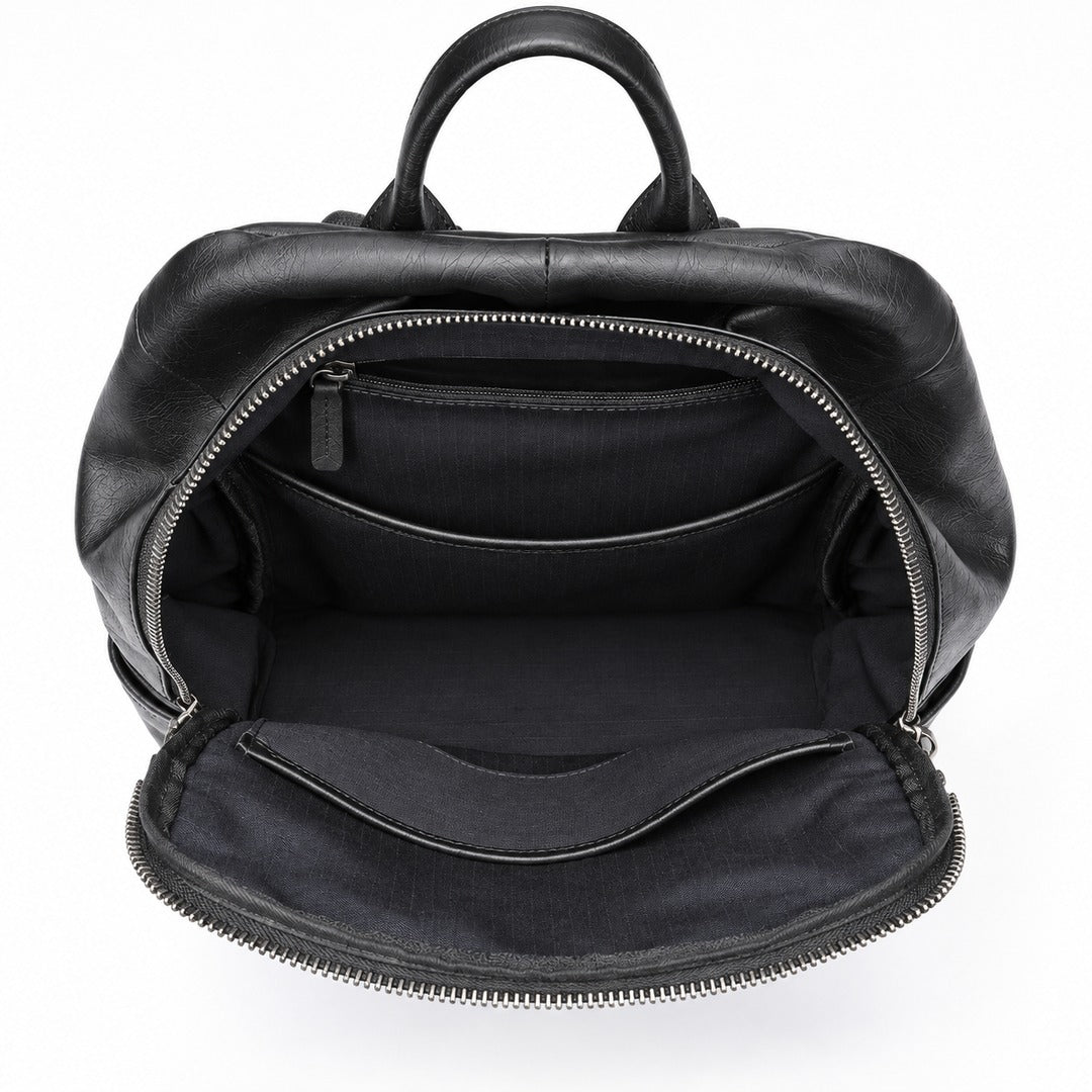 Black leather backpack shown open to display its interior compartments, including a top handle, zippered main compartment, and padded laptop sleeve, on a white background.