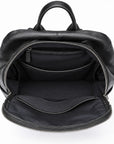 Black leather backpack shown open to display its interior compartments, including a top handle, zippered main compartment, and padded laptop sleeve, on a white background.