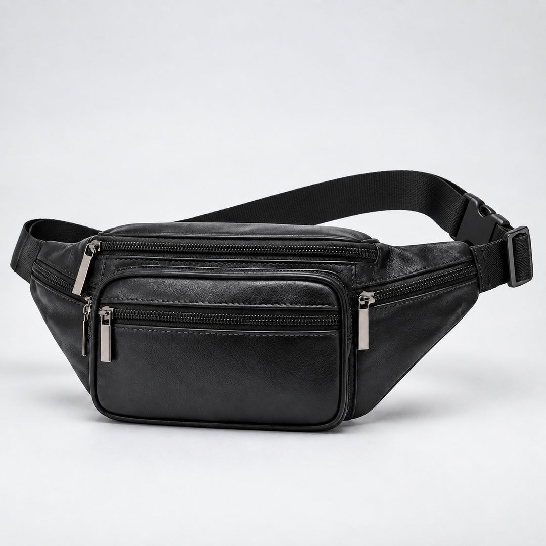 A black genuine leather waist bag with multiple zippered compartments and an adjustable black webbing strap, shown on a light gray studio background.