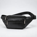 A black genuine leather waist bag with multiple zippered compartments and an adjustable black webbing strap, shown on a light gray studio background.