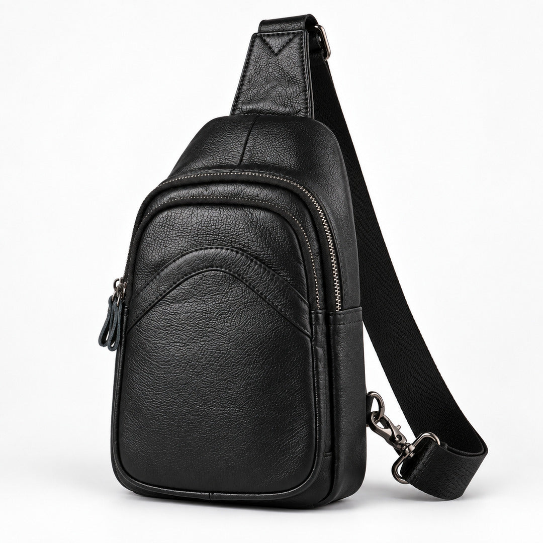 Black textured leather sling bag with a single shoulder strap, shown on a clean white background.
