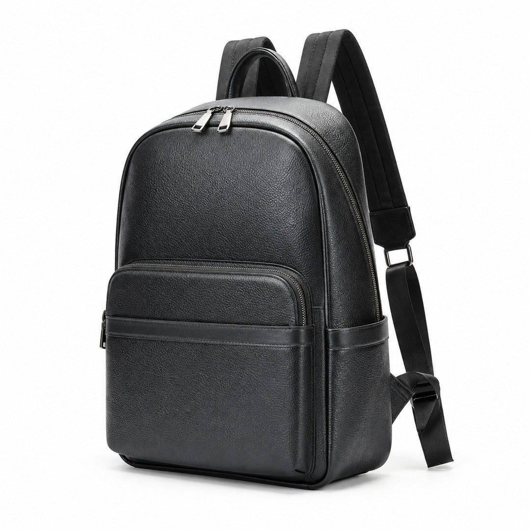 A black leather backpack with a front zippered pocket and adjustable shoulder straps, shown from a three-quarter angle on a white background.