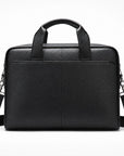 A black textured leather briefcase with dual top handles and an adjustable shoulder strap, shown against a plain white background.