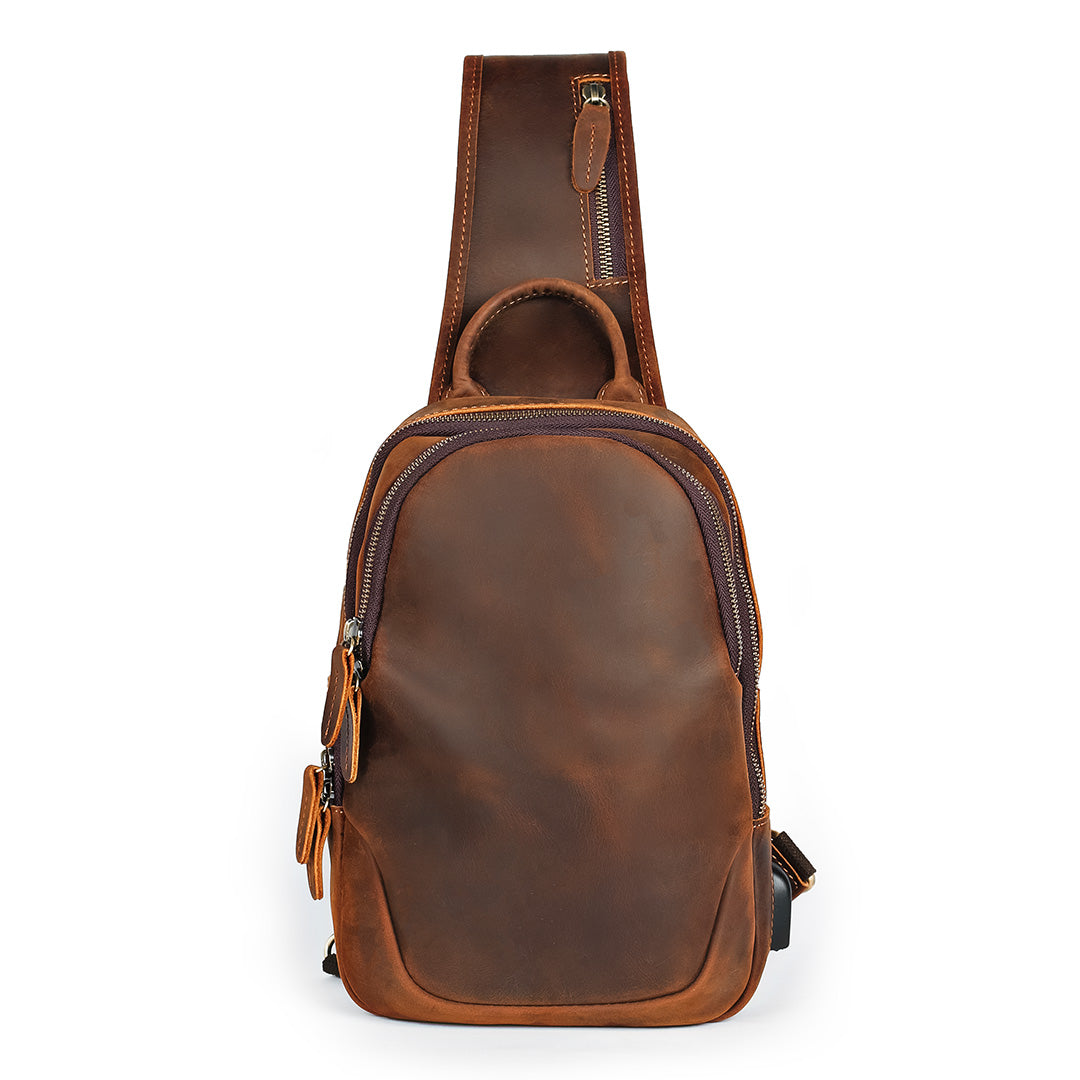 Front view of men’s brown leather sling bag with shoulder strap