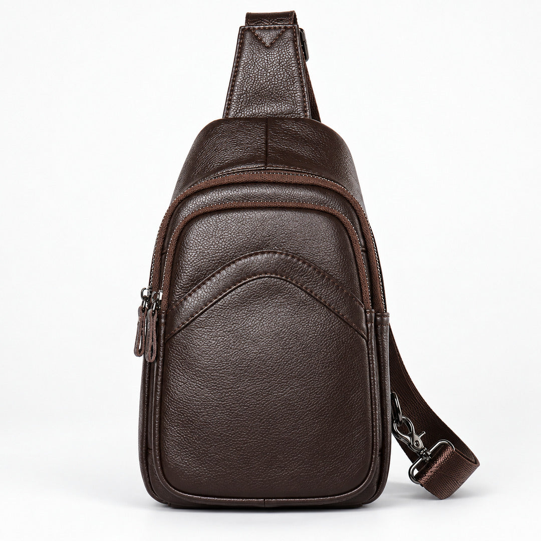 A dark brown leather crossbody bag with a matching adjustable shoulder strap, shown against a plain white background.