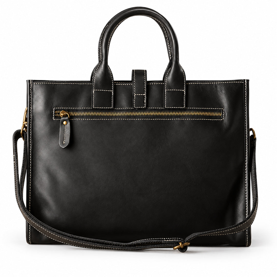 Men's black full-grain leather tote bag back with an exterior zip pocket and contrast stitching