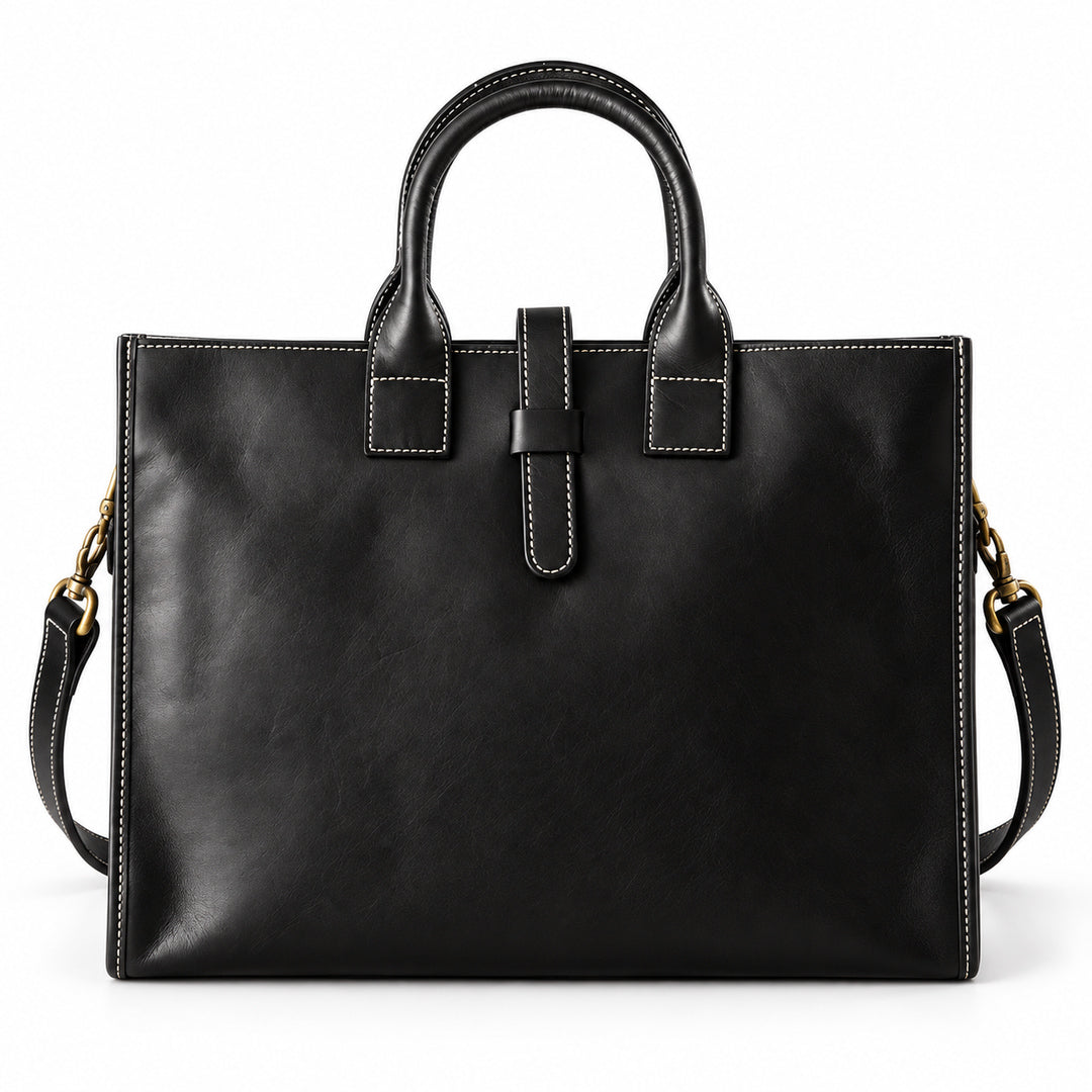 Men's black full-grain leather tote bag with contrast stitching, rounded handles and a leather tab closure