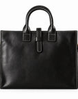 Men's black full-grain leather tote bag with contrast stitching, rounded handles and a leather tab closure