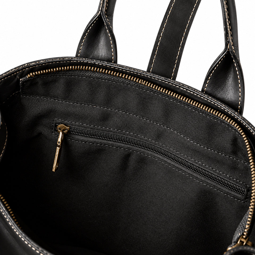 Men's black full-grain leather tote bag interior zip pocket with black fabric lining