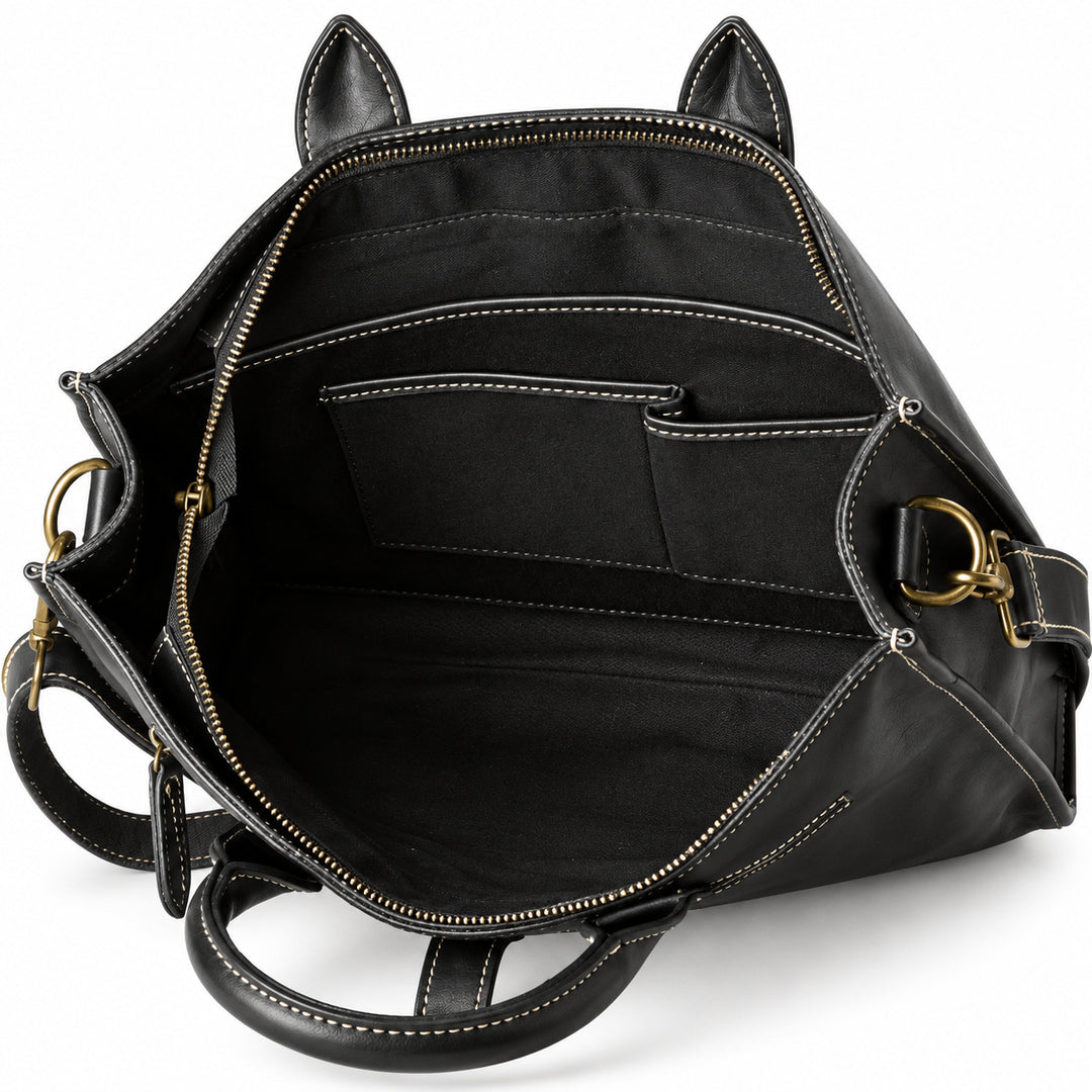 Men's black full-grain leather tote bag open interior with a large sleeve and two organizer pockets