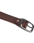 Flat view of a premium leather belt with visible buckle and hand-stitched details, ideal for pairing with jeans or trousers.