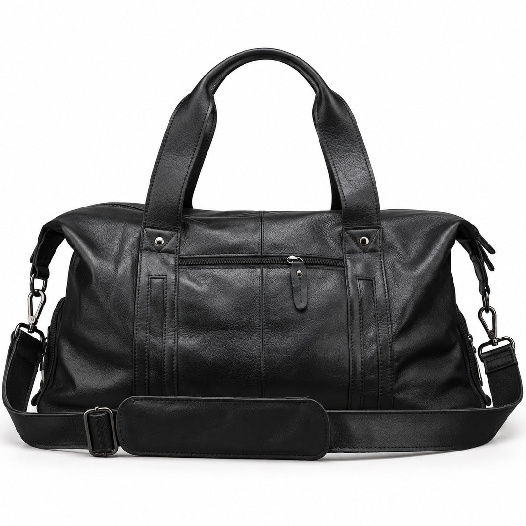 Modern black full-grain leather duffel bag with front zip pocket and wide leather handles.