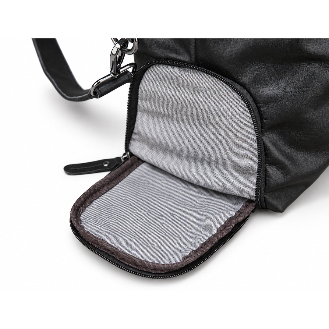 Modern black full-grain leather duffel bag with an open side pocket and gray fabric lining.