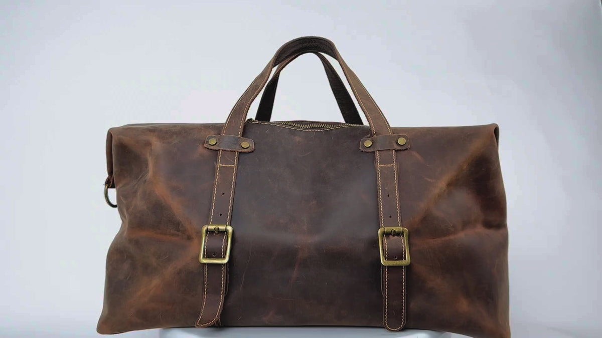 Vintage leather duffle bag, crafted from premium Crazy Horse leather, durable and stylish for travel.