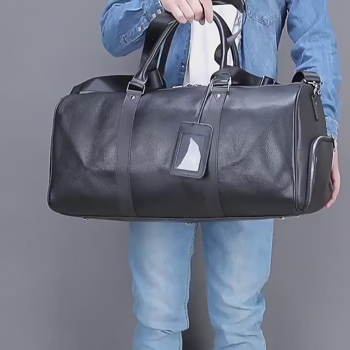 Men showing black leather duffel weekender bag with shoe compartment