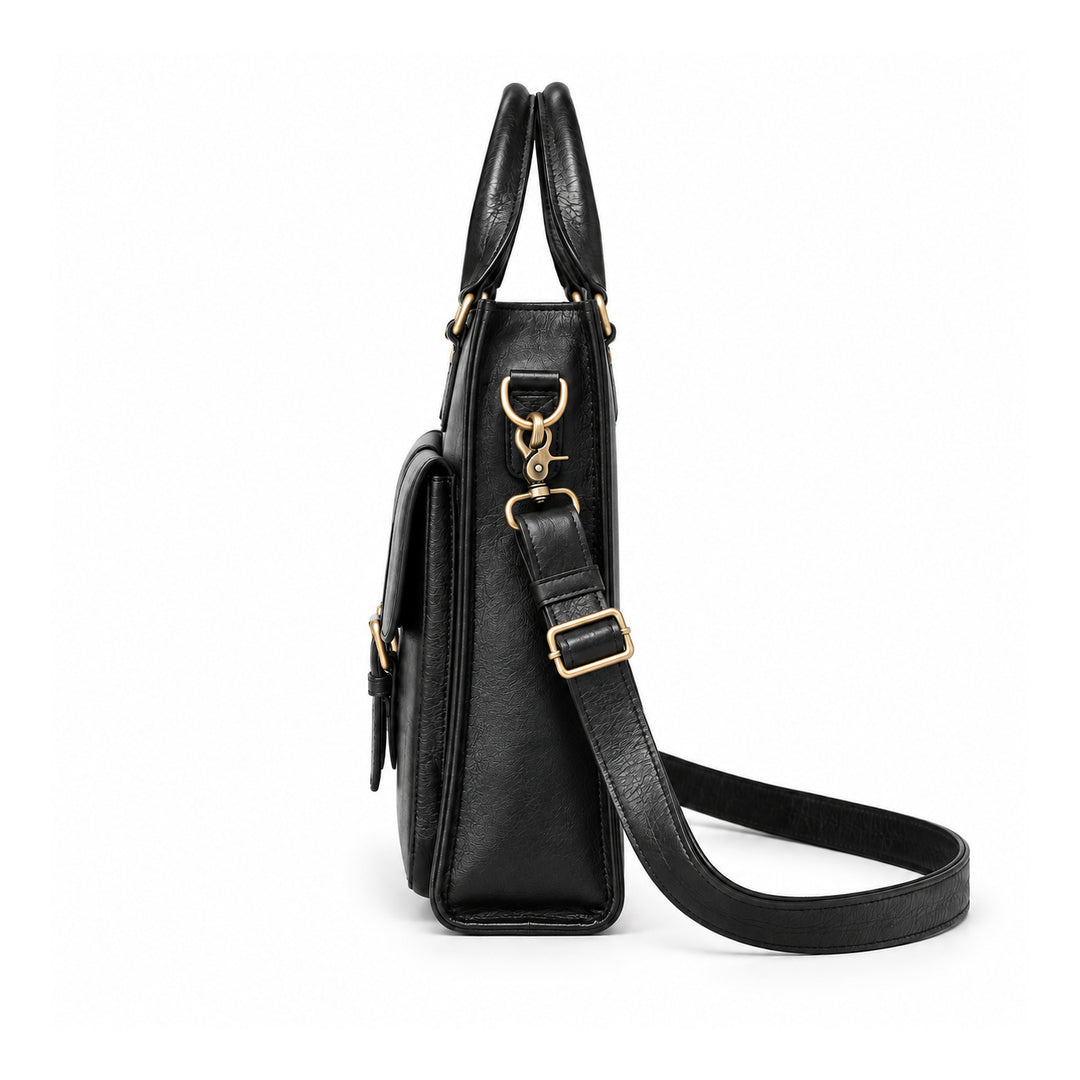 A black leather briefcase is shown in side profile with a slim gusset, brass-tone clasp and adjustable shoulder strap.