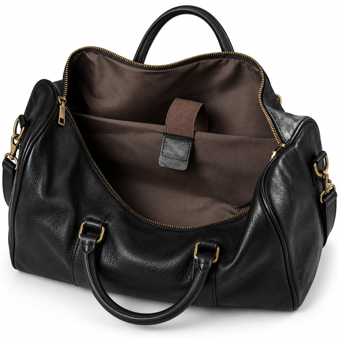 Refined black full-grain leather duffel bag inner sleeve with a fabric retaining strap