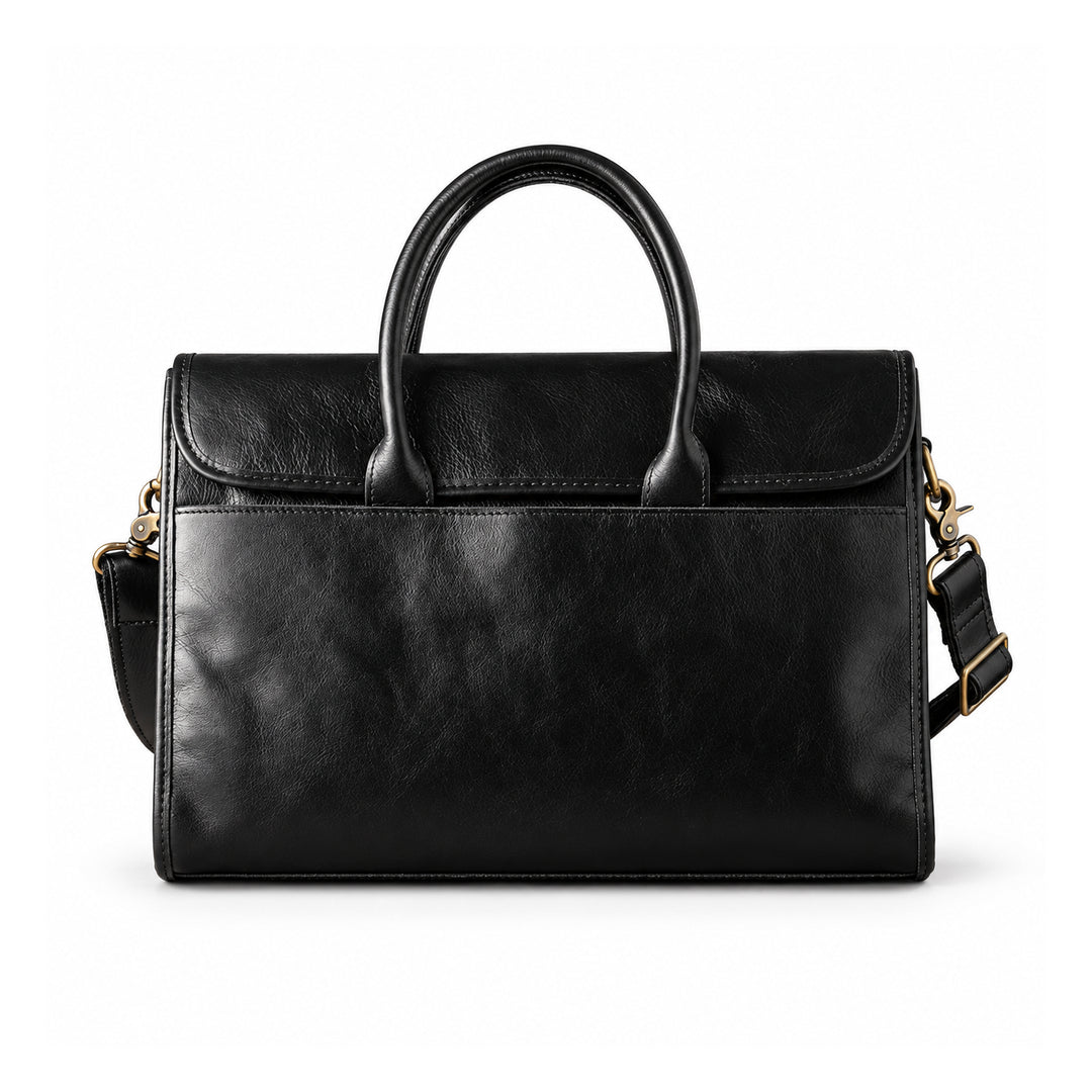 A black full-grain leather briefcase is shown from the front with a closed flap, rounded handles and a plain exterior pocket.