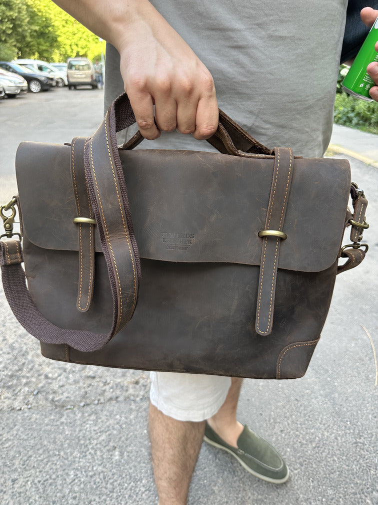 Stylish leather briefcase for men, perfect for business use and carrying a laptop.